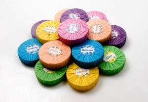PlissÃ¨ wrapped Soap Sponges